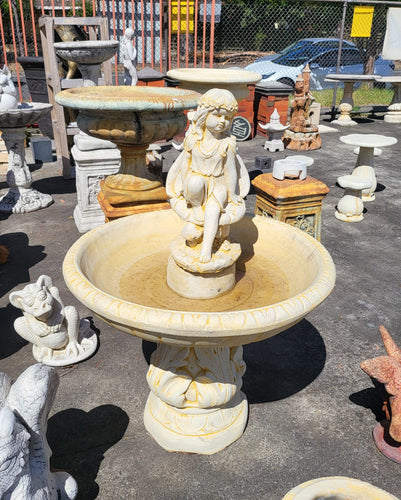 Angel Sitting On Mushroom Fountain