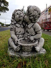 Kissing Boy and Girl with Bucket