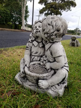 Kissing Boy and Girl with Bucket