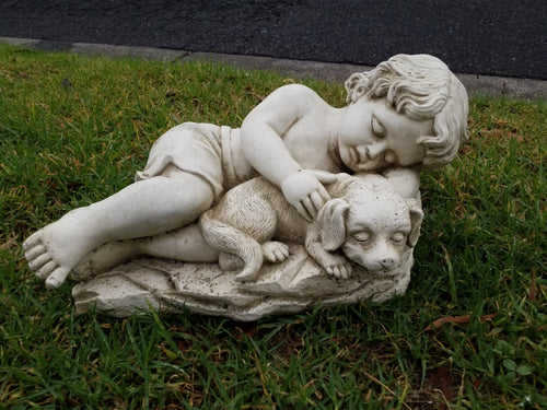 Laying boy with Dog