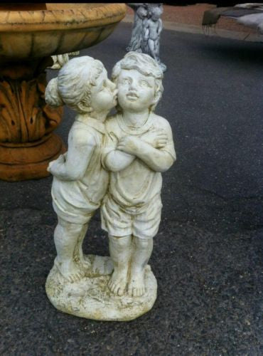 Girl Kissing Boy Concrete
