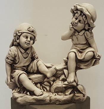 Boy and girl On Sea Saw