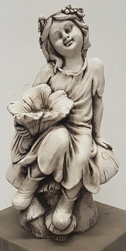 Girl Fairy Sitting on Mushroom Left