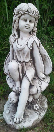 Sitting Fairy On Mushroom