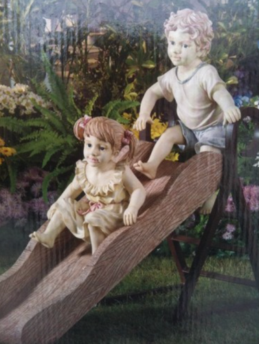 Boy Girl on Slide Statue