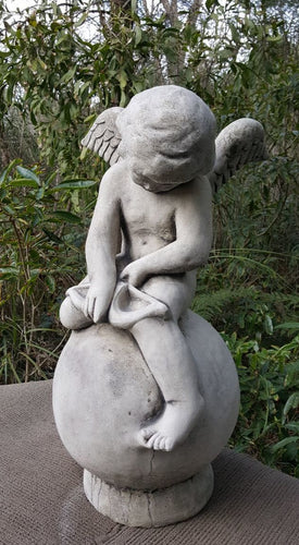 Angel On Ball (cupid large head)